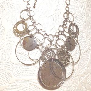 Mult-Ring Dangle Necklace.Bright Shiny Silver Tone